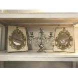 A pair of ormalu gilded wall mirrors and a 3 arm candelabra with glass droppers