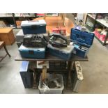 A large quantity of tool boxes and accessories