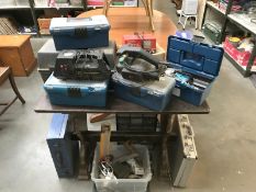 A large quantity of tool boxes and accessories