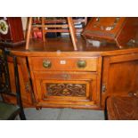 An oak sideboard.