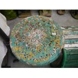 A vintage cast iron round garden table