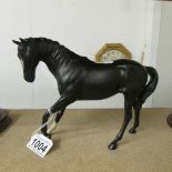A Beswick black stallion.