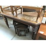 A Victorian mahogany extending dining table