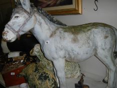 A large plastic/ resin donkey