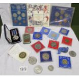 A mixed lot of commemorative coins etc.