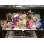 A shelf of soft toys including Ty Beanie Babies