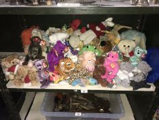 A shelf of soft toys including Ty Beanie Babies