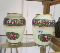 A pair of Minton's Rotique vases,