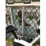 A leaded glass window in a frame a/f