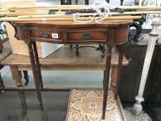 A dark wood stained 'reprodux' 2 drawer wall table