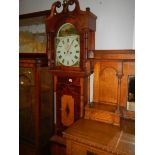 An oak Grandfather clock.