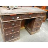 An old pine kneehole desk