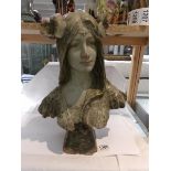 A French art nouveau bust of a lady, signed.