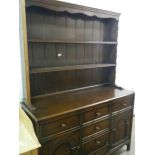 A 1930's dark oak dresser