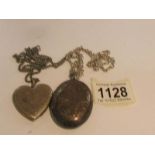 A silver locket on silver chain (approximately 35 grams) and a silver heart locket (approximately