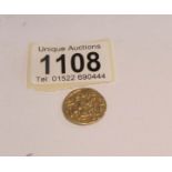 An early gold coin, 4 grams (possibly 22ct gold).