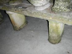 A 2 pillar stone garden bench