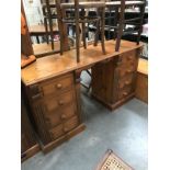 A solid pine double pedestal dressing table