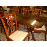 A mahogany extending dining table & 6 chairs & 2 other chairs (not matching)
