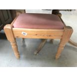 A pine bedroom stool