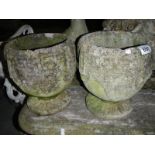 A pair of garden urns