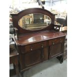 An Edwardian mahogany mirror back sideboard