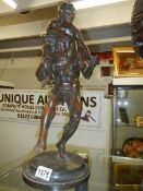 A large heavy bronze figure.