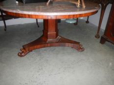 A Victorian mahogany tip top table (painted).