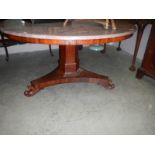 A Victorian mahogany tip top table (painted).