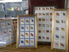 5 framed and glazed sets of silk cigarette cards of flags.
