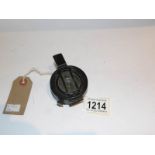 A military compass with war office arrow marked 'T.G. Co., Ltd., London, NO. B6382, 1939, MKIII'.
