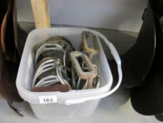 A bucket of 17 odd stirrups and 4 old spurs (steam punk interest)