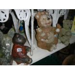 4 stone garden ornaments of bears and a fox