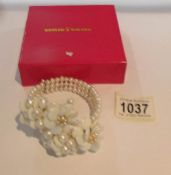 A Butler & Wilson cultured pearl bracelet in original box.