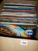A box of LP records including ELO 'Out of the Blue' blue vinyl with poster etc and 2 Beatles LP's.