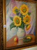 A 20th century oil on canvas still life study featuring sunflowers with Russian detail to frame and