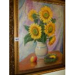 A 20th century oil on canvas still life study featuring sunflowers with Russian detail to frame and