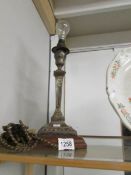 A 1920's silver plate table lamp base.