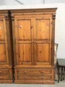 A double pine wardrobe with 2 drawers