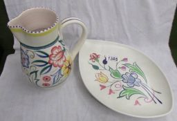 A Poole pottery jug and plate.