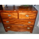 A Victorian mahogany chest of drawers with cross banded inlay to top