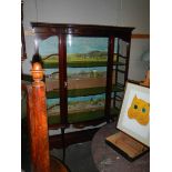 A mahogany display cabinet.