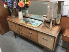 A retro teak effect 3 piece bedroom suite, dressing table, wardrobe,