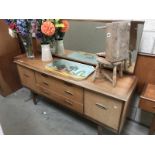 A retro teak effect 3 piece bedroom suite, dressing table, wardrobe,