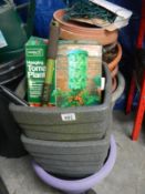 A large quantity of plastic plant pots etc.