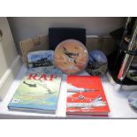 A boxed Royal Worcester Johhne Johnson plate and other RAF related plates and books