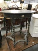 A 1930's oak barley twist side table