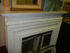 A Victorian cast iron Coalbrookdale fire surround, makers mark to rear.