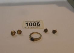 A 9ct gold ring set onyx, size N and 2 pairs of earrings (missing one back).