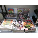 A large collection of Judge Dredd and 2000AD comics